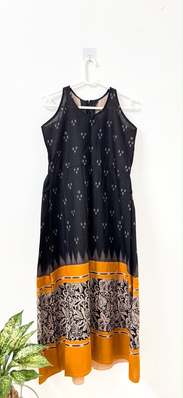 WhatsApp Image 2026-07-01 at 8.24.58 PM (3) Black and yellow ikkat print dress - Image 1