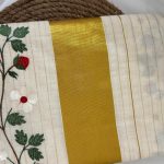 Onam saree with embroidery motif
